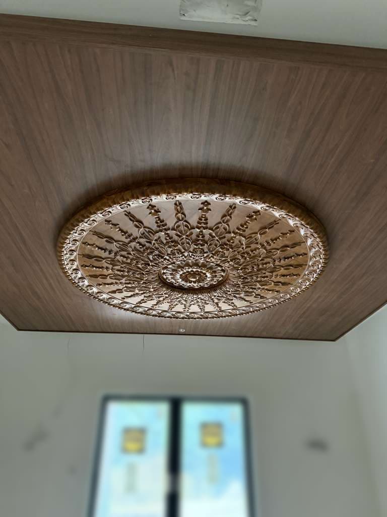 Carved round teak table top shipped to the USA